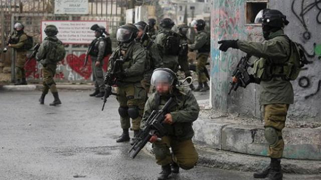 İsrail askerleri 11 Filistinliyi gözaltına aldı