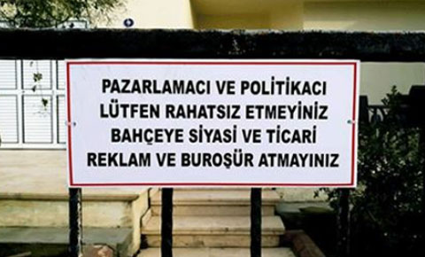 Çareyi tabela yaptırmakta buldu