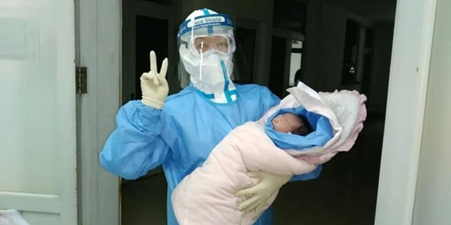 Çin'de yeni tip koronavirüs taşıyan kadın sağlıklı bir bebek dünyaya getirdi