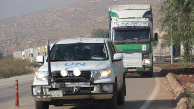 BM'den Suriyelilere 13 tırlık insani yardım malzemesi