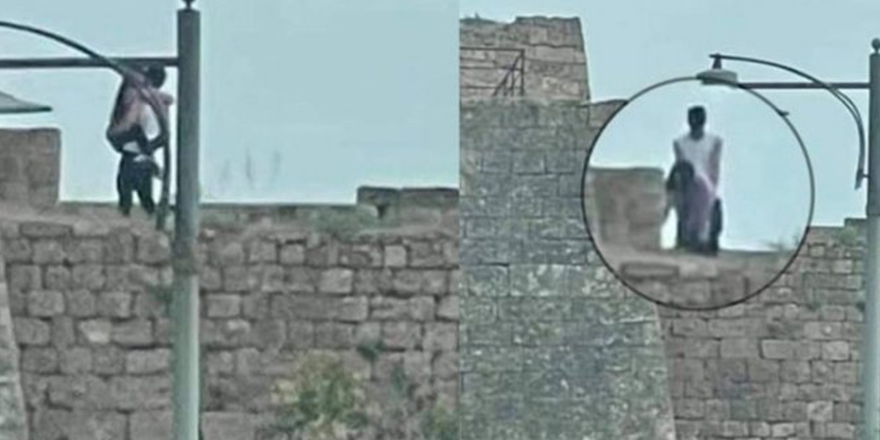 Güpegündüz surlar üstünde seks yaptılar!