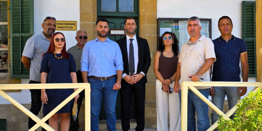 Yabancı işçilerin maaş kesintisine izin veren yasa değişikliğini yargıya taşındı