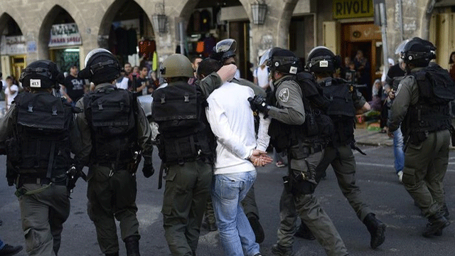 İsrail askerlerinden 13 Filistinliye gözaltı