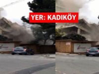 Kadıköy'de bir binanın yıkımı sırasında moloz parçaları yoldan geçen aracın üstüne düştü
