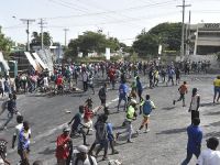 Haiti'de hükümetin yakıta zam planı yağma ve kundaklama olaylarına yol açtı
