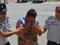 Polisleri görünce saklanmaya çalıştı