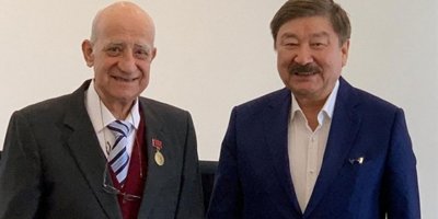 Türksoy'dan Serakıncı'ya onur madalyası