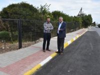 Karaoğlanoğlu yolunda kaldırım, bordür boyama ve genişleyen yolun asfaltlanmasıyla ilgili çalışmalar tamamlandı