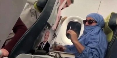 Uçakta 'Ben FETÖ'cüyüm' diye bağıran kadın hakkında istenilen ceza belli oldu