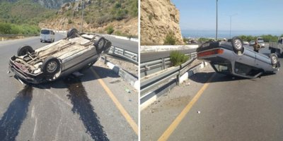 Çelik bariyerlere çarptı, takla attı