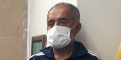 Telefonu vermediği eşini darp etti