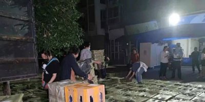 Çin'de kapalı kutularda canlı hayvan satışı tepki çekti