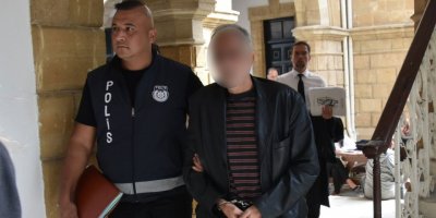 Evinde tabanca ve canlı mermi çıktı